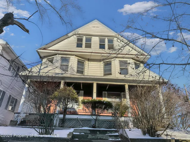 a front view of a house with balcony