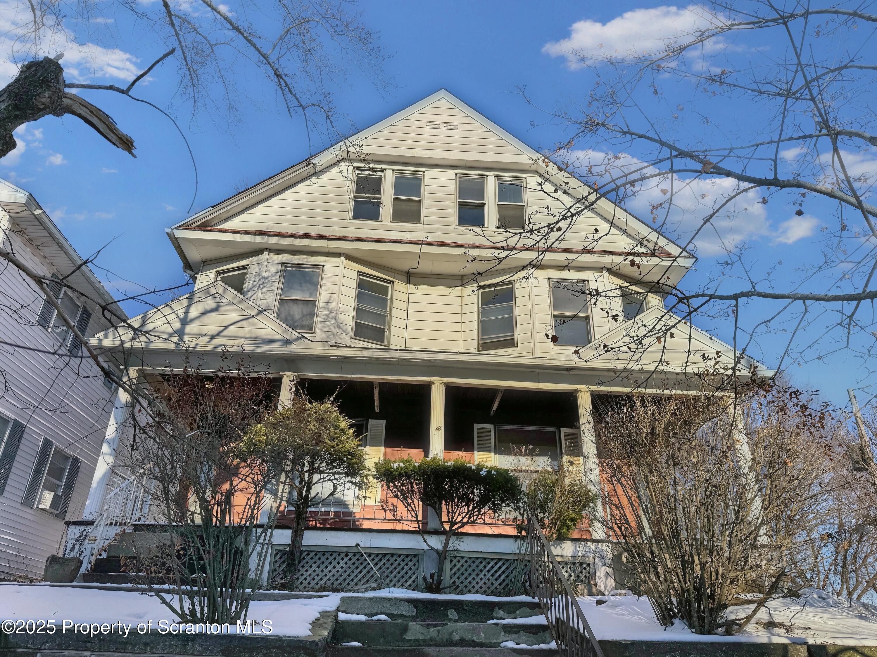 1513 15 Myrtle Street Scranton, PA 18510 - Photo 21 of 22 a front view of a house with balcony