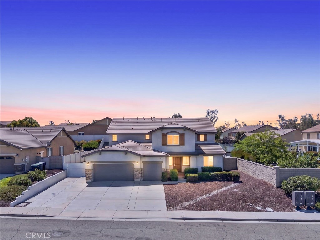 23347 Crystal Way Wildomar, CA 92595 - Photo 3 of 109 a view of a big house with a big yard
