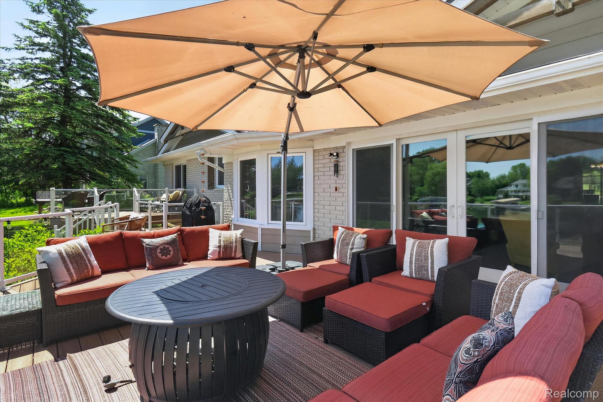 3860 East Commerce Road Commerce Township, MI 48382 - Photo 49 of 72 Expansive outdoor deck featuring wood-finish flooring