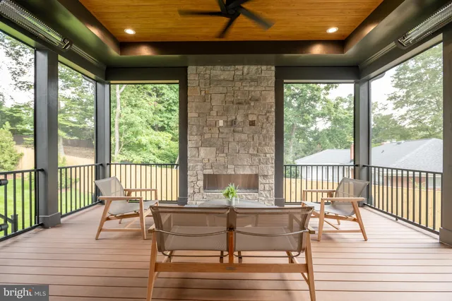 a view of a porch with wooden floor