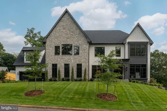 a picture of a bench in front of a white wall
