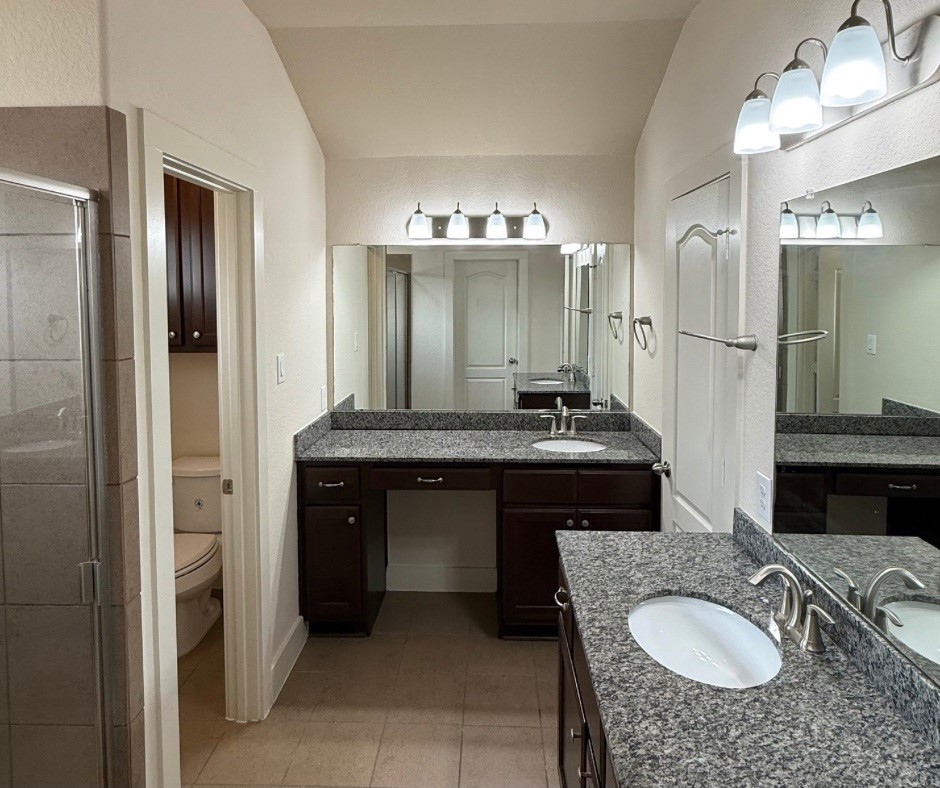 20607 Alfonso Court Spring, TX 77388 - Photo 14 of 26 a bathroom with a sink and a mirror