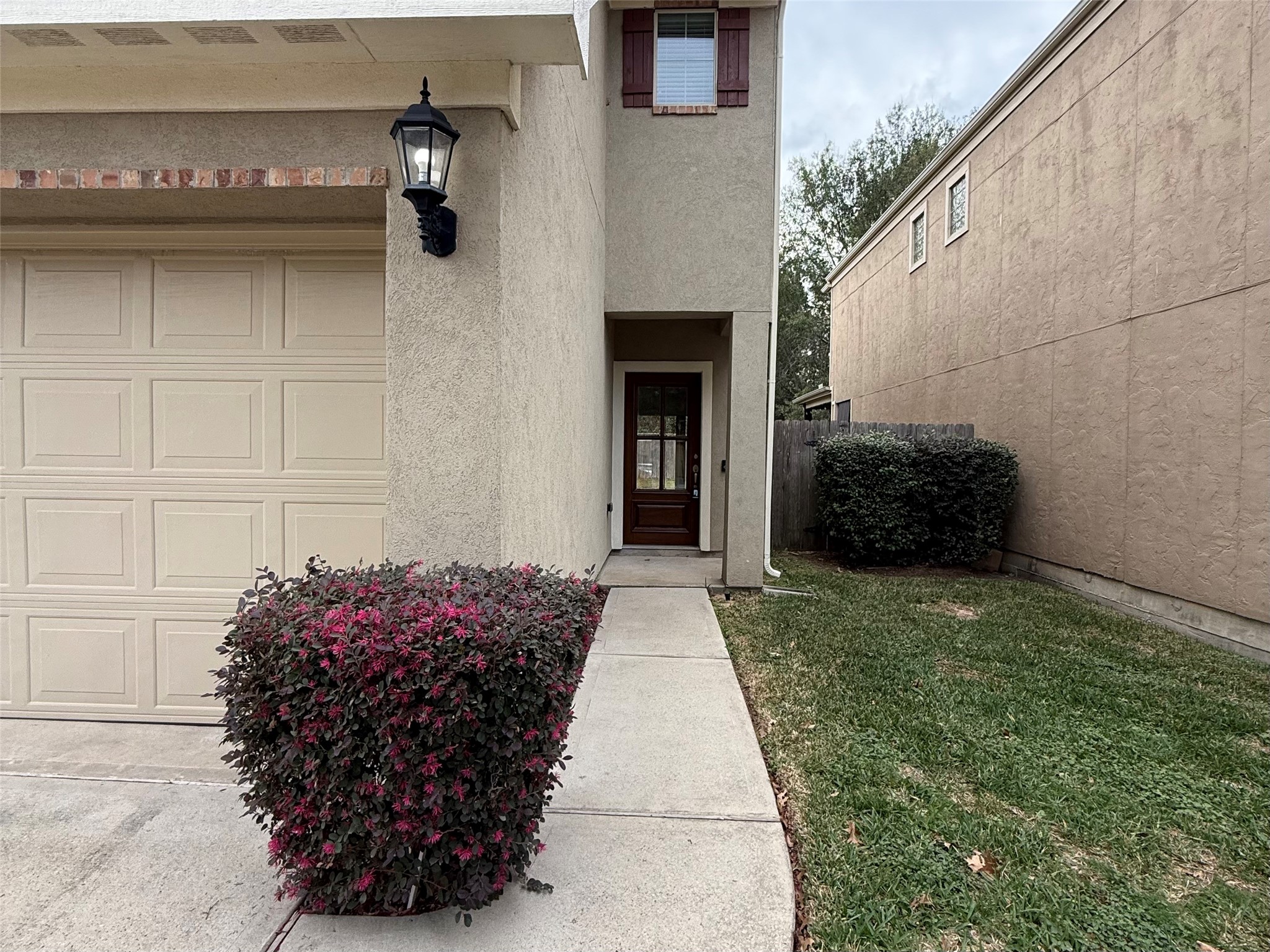 20607 Alfonso Court Spring, TX 77388 - Photo 22 of 25 Alternate front exterior angle highlighting architectural details and mature landscaping.