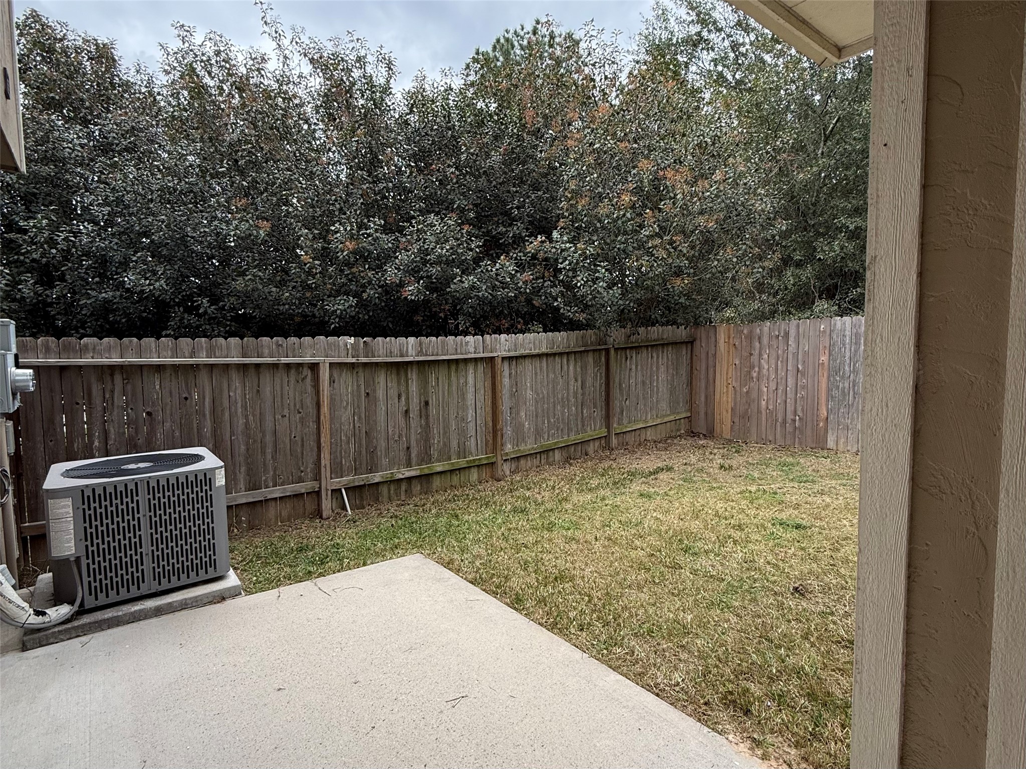 20607 Alfonso Court Spring, TX 77388 - Photo 26 of 26 a backyard of a house with lawn chairs and wooden fence