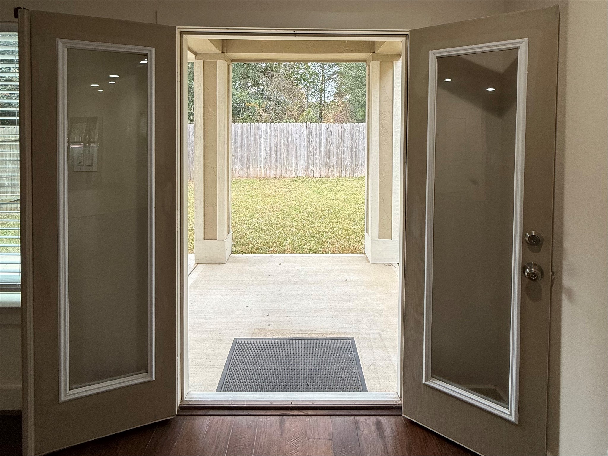 20607 Alfonso Court Spring, TX 77388 - Photo 5 of 25 French doors opening to covered patio and fully fenced backyard.