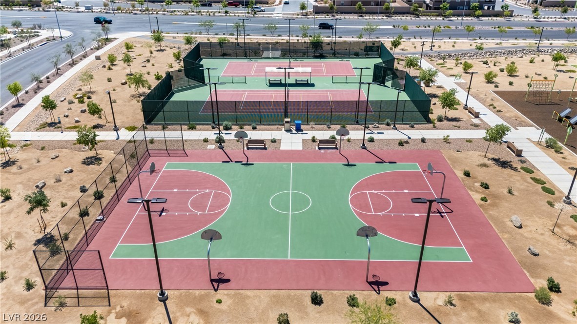 320 Isla Enclave Way Henderson, NV 89011 - Photo 42 of 49 This community recreation area features well-maintained courts for both basketball and tennis.