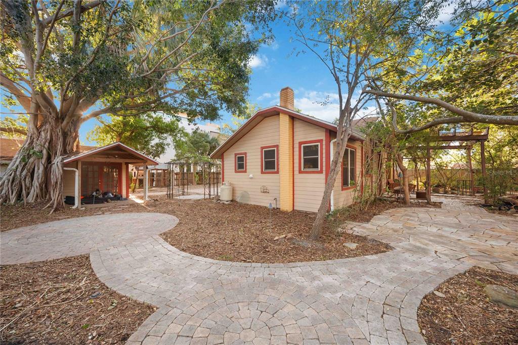1721 8th Street Sarasota, FL 34236 - Photo 21 of 41 a view of a house with a yard