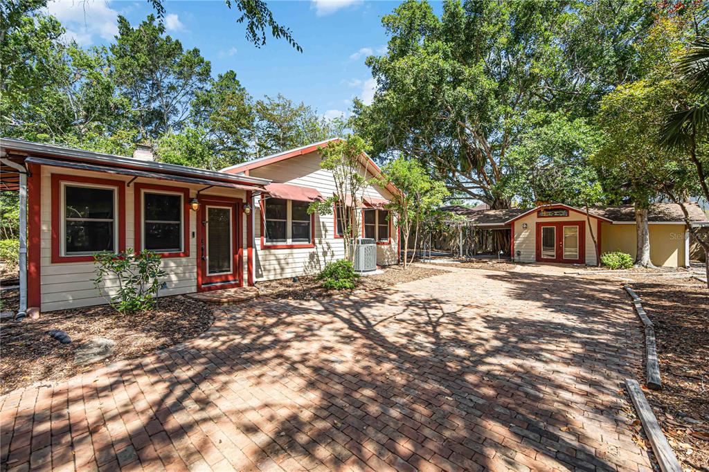 1721 8th Street Sarasota, FL 34236 - Photo 25 of 41 a front view of a house with garden