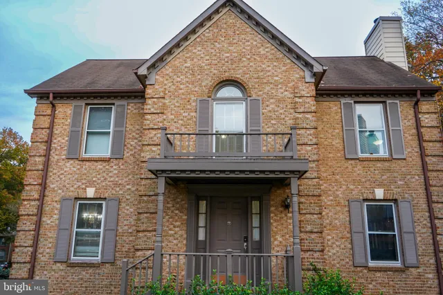 a view of a house with entrance gate
