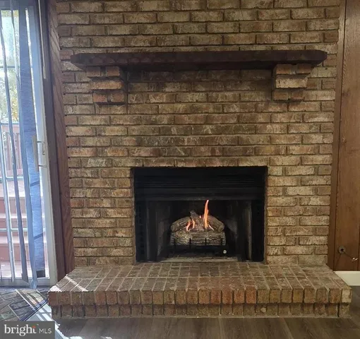 a room with fireplace and a fireplace