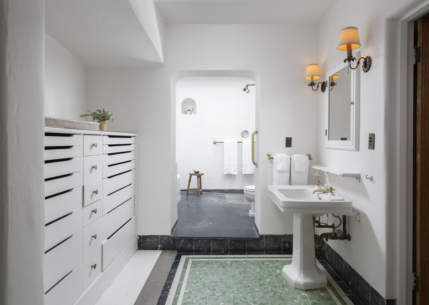 680 Buena Vista Drive Montecito, CA 93108 - Photo 12 of 33 wooden floor with a sink and a mirror