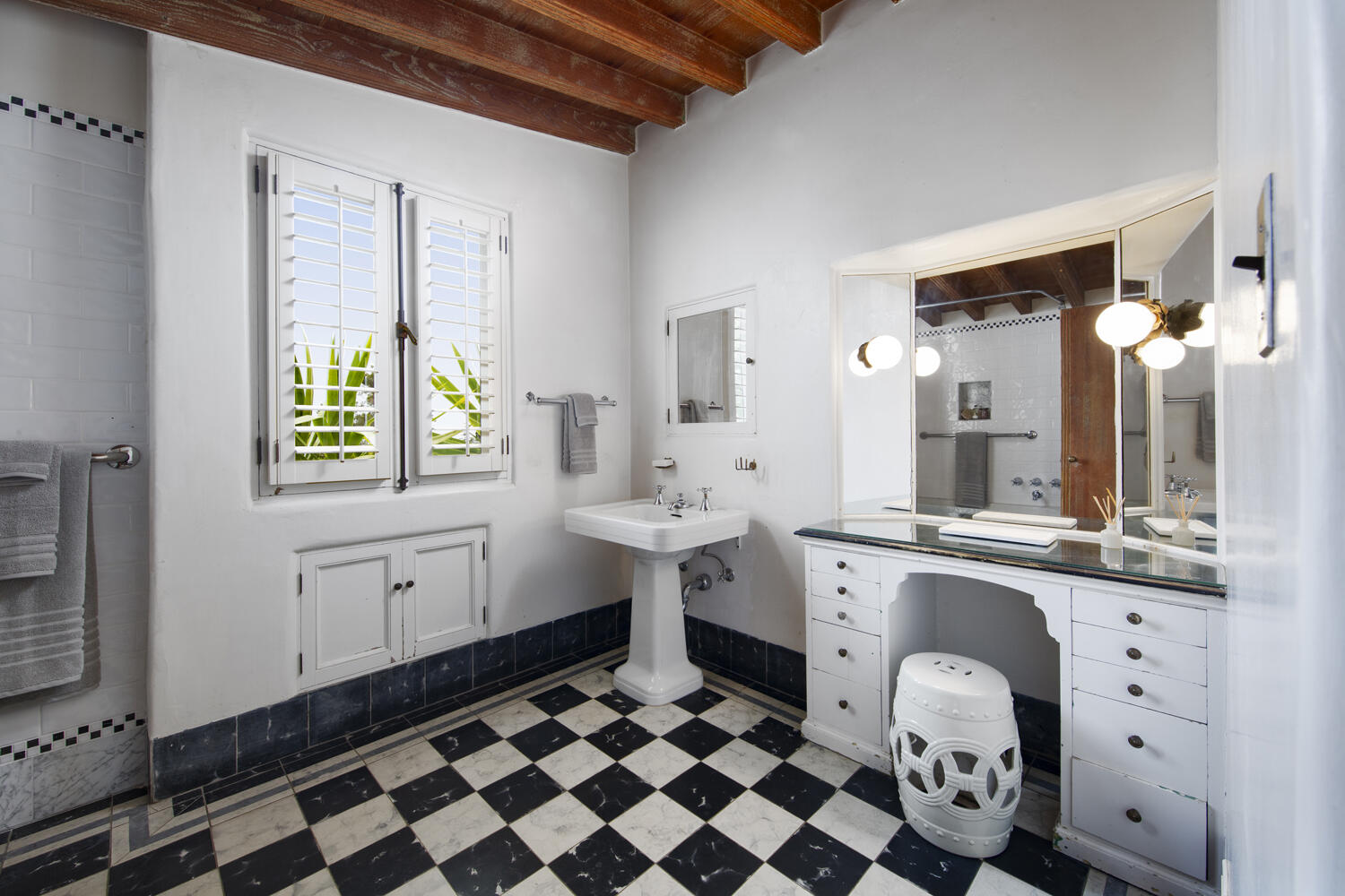 680 Buena Vista Drive Montecito, CA 93108 - Photo 14 of 33 a room with white cabinets and a window