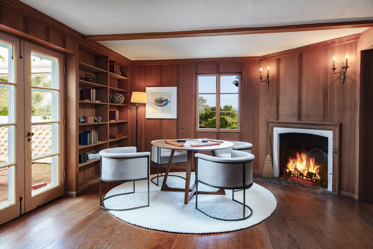 680 Buena Vista Drive Montecito, CA 93108 - Photo 21 of 33 a living room with furniture a fireplace and a floor to ceiling window