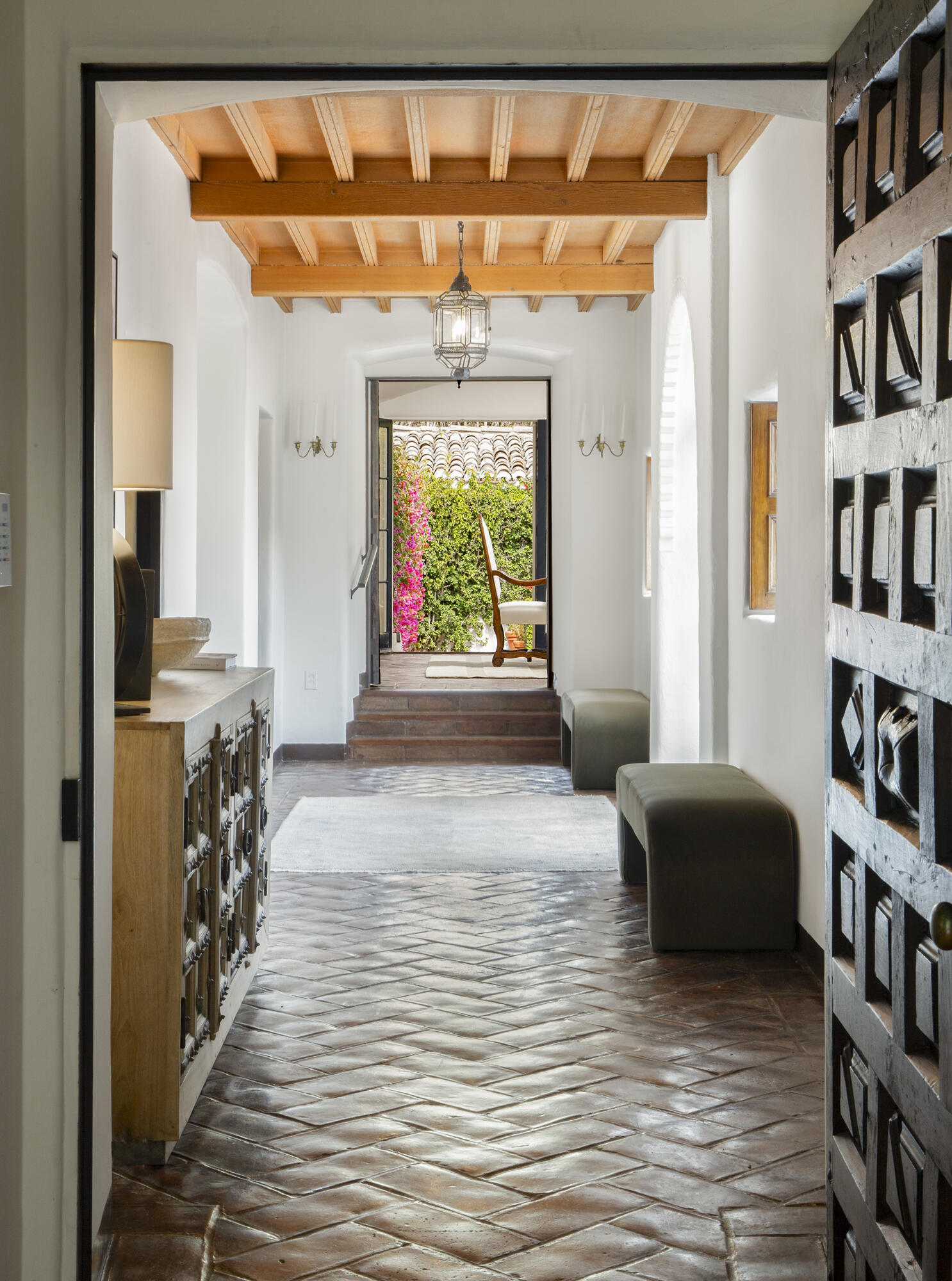 680 Buena Vista Drive Montecito, CA 93108 - Photo 5 of 33 a hallway with a large window and a rug