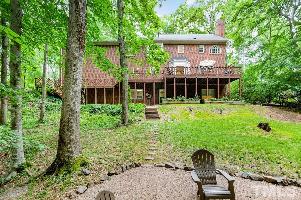 705 Presnell Court Raleigh, NC 27615 - Photo 27 of 30 a front view of a house with garden