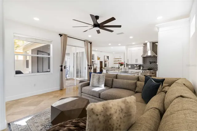a kitchen with a sink refrigerator and microwave