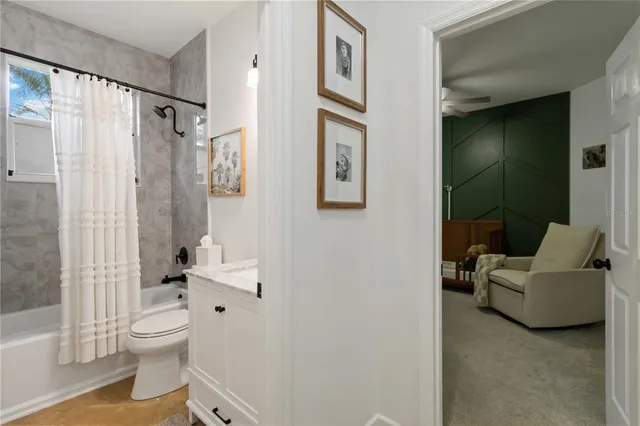 a view of a bedroom with furniture and staircase