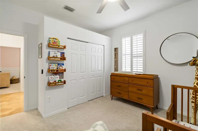 a room with toys and dresser