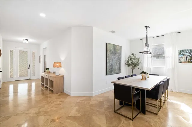 a view of a dining room with furniture