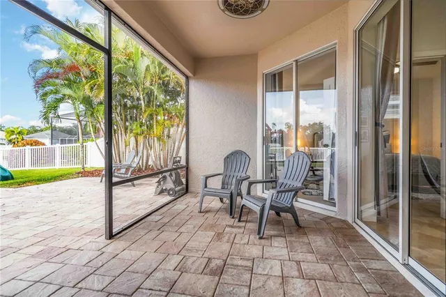a view of a park with swings and slides