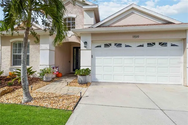 a front view of a house with yard