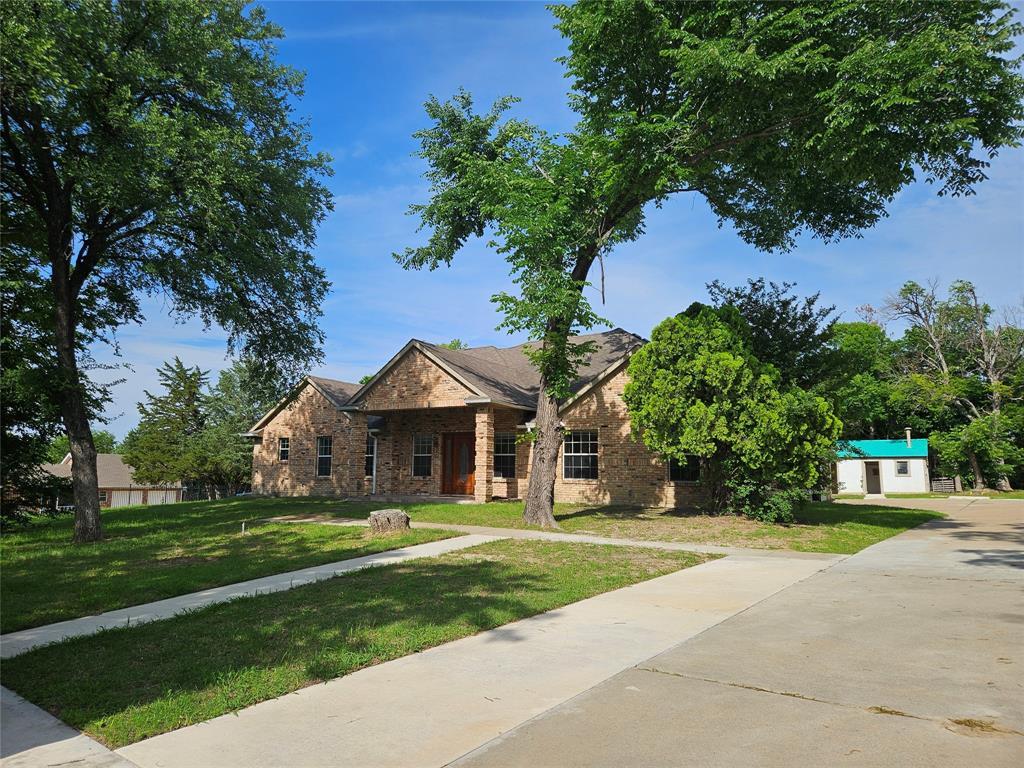 234 East Fork Road Sunnyvale, TX 75182 - Photo 2 of 32 a front view of a house with a yard