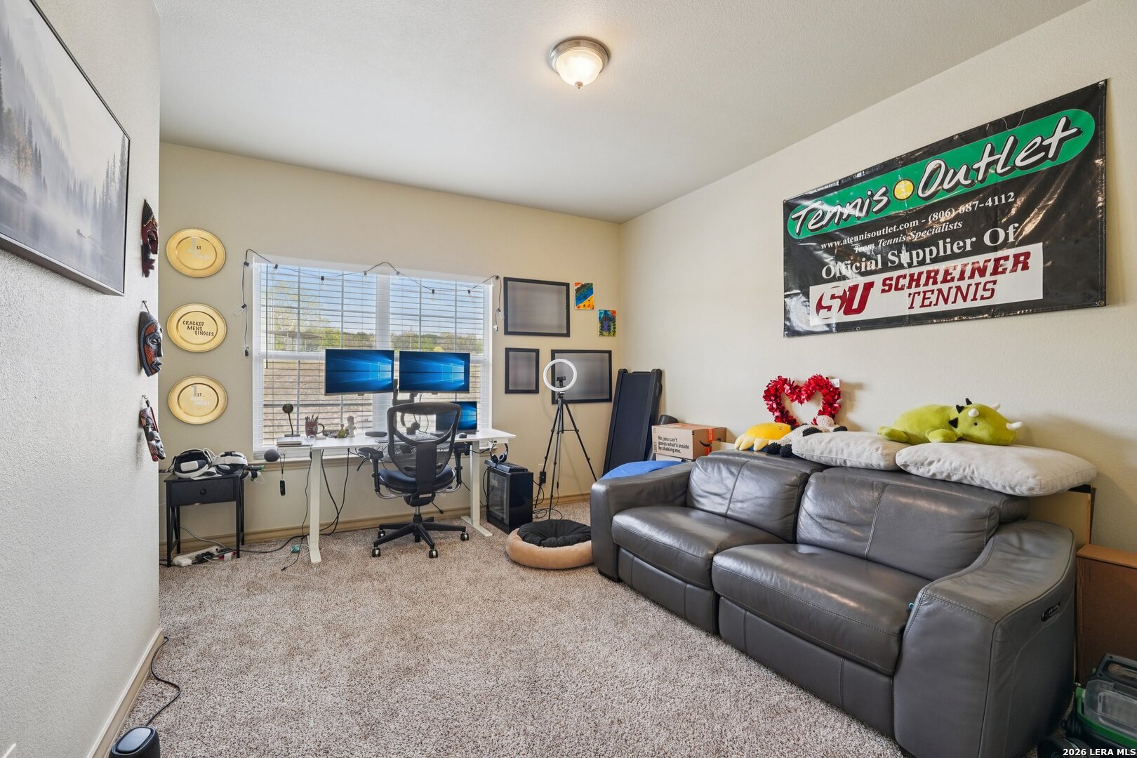 2312 Sailing Way, Unit C Kerrville, TX 78028 - Photo 22 of 26 a living room with furniture and a flat screen tv
