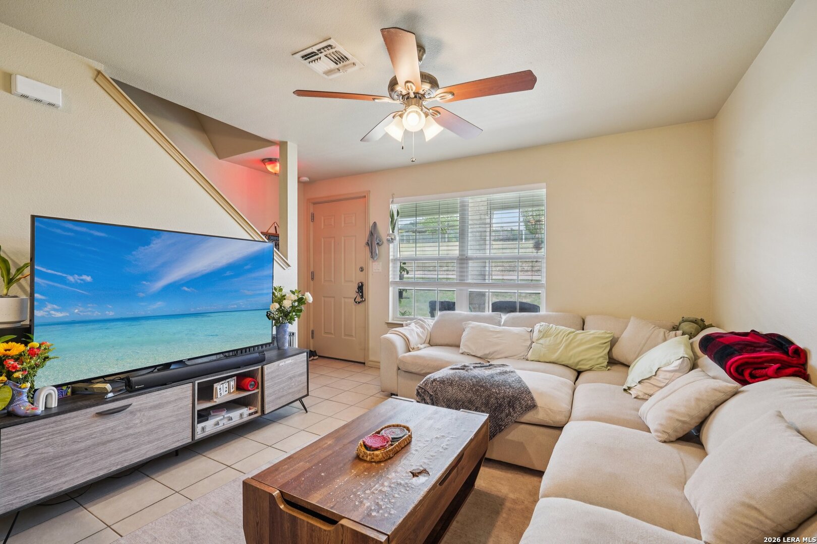 2312 Sailing Way, Unit C Kerrville, TX 78028 - Photo 6 of 26 a living room with furniture and a flat screen tv