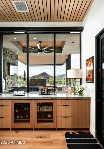 a bathroom with a sink a mirror and a bathtub
