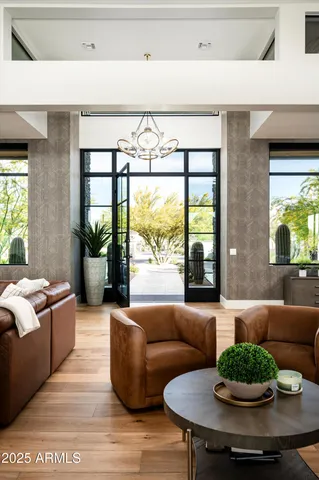 a bedroom with a bed and a mirror