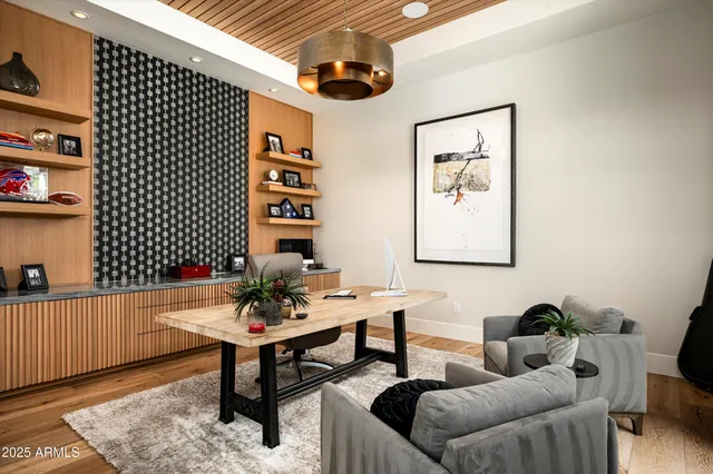 a kitchen with a cabinets and chairs