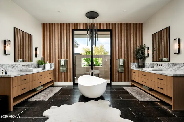 a view of a house with swimming pool and porch