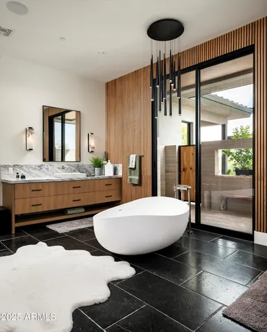 a view of a chairs and table on the wooden floor