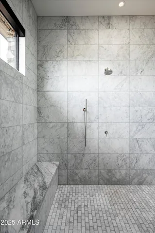 a view of swimming pool with outdoor seating and a patio