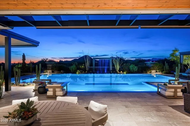 an aerial view of houses with outdoor space