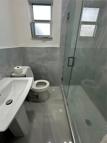 a bathroom with a sink and a toilet