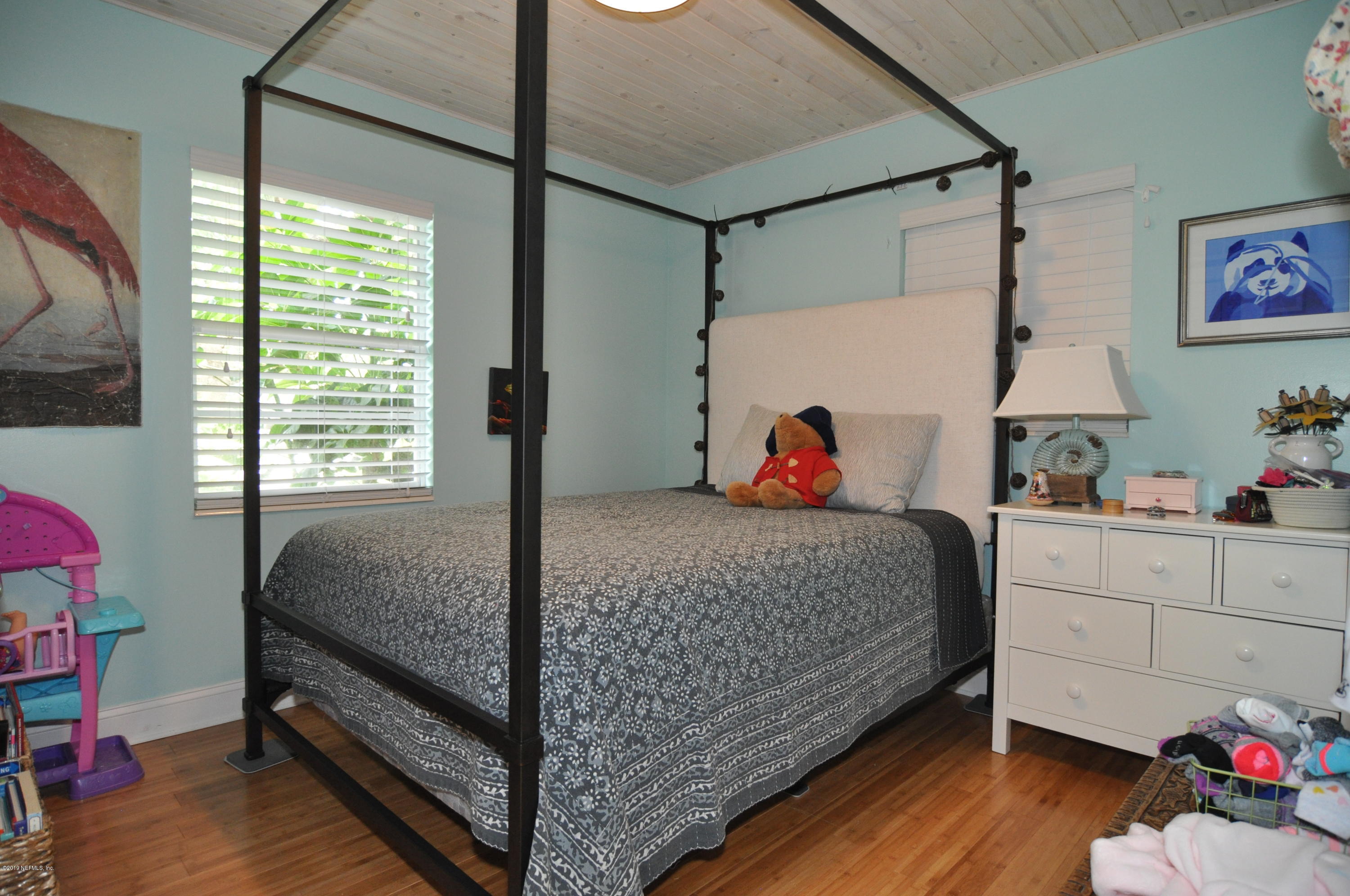 348 Jasmine Road St. Augustine, FL 32086 - Photo 11 of 15 a bedroom with a bed and a window