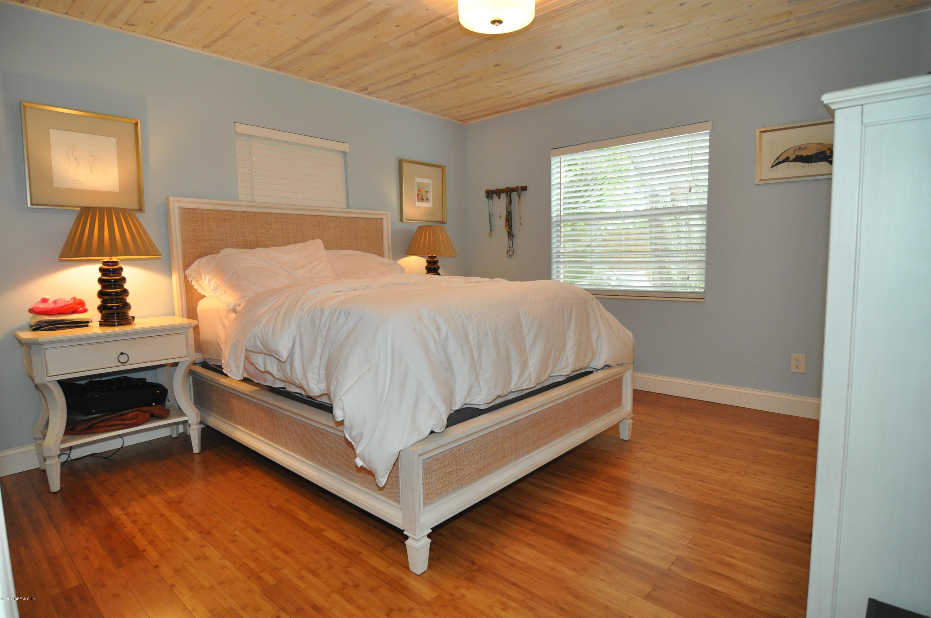 348 Jasmine Road St. Augustine, FL 32086 - Photo 12 of 15 a bedroom with a bed and window