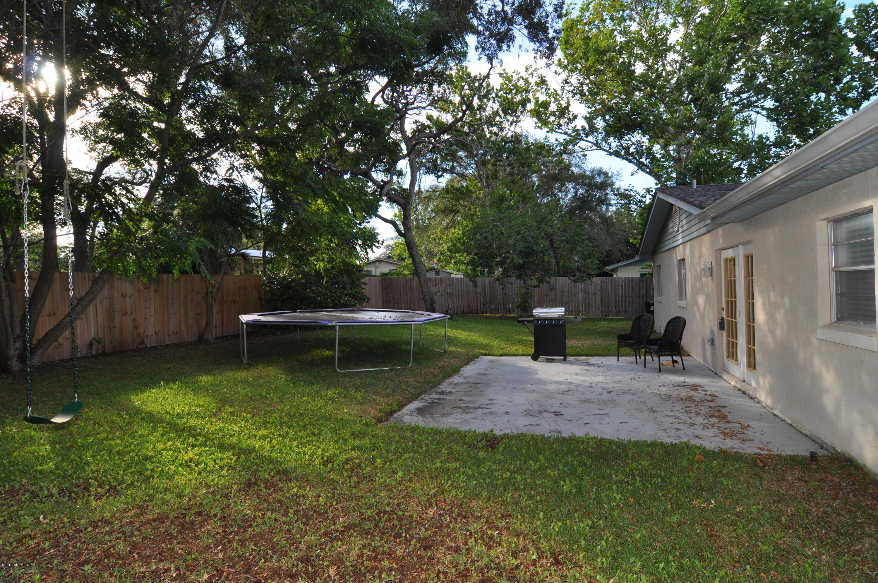 348 Jasmine Road St. Augustine, FL 32086 - Photo 14 of 15 a view of a backyard with a garden