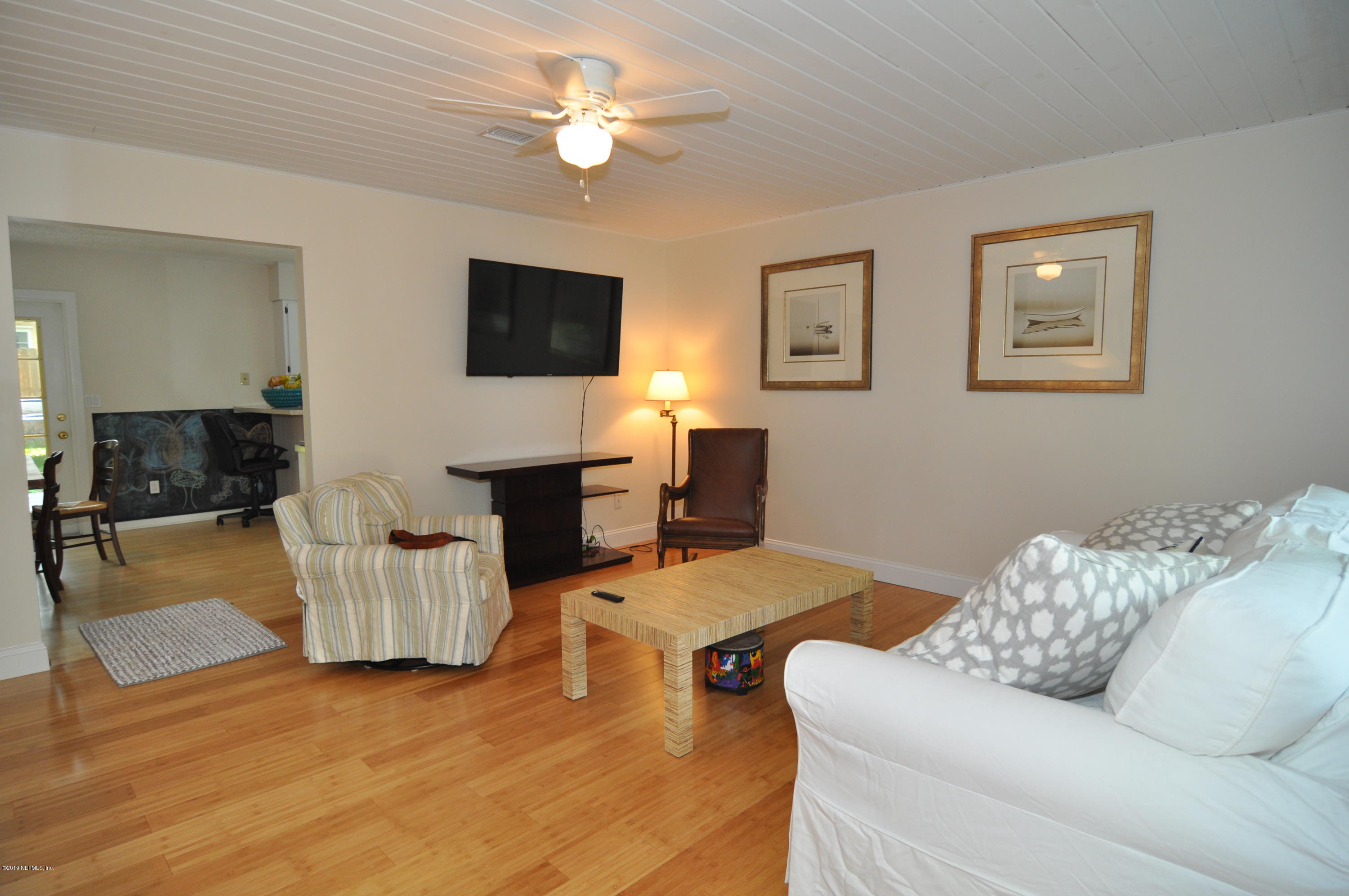 348 Jasmine Road St. Augustine, FL 32086 - Photo 3 of 15 a living room with furniture and a flat screen tv