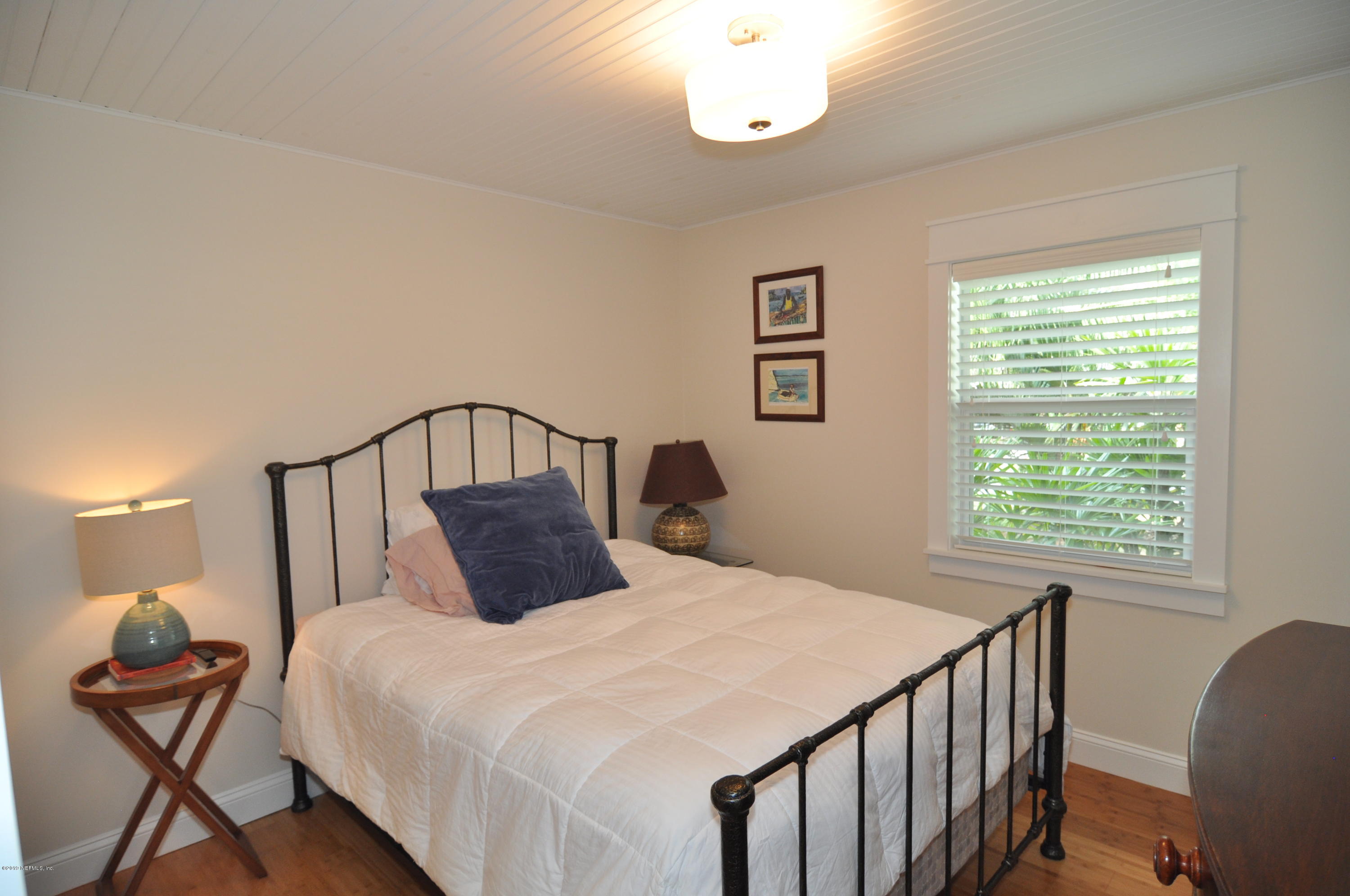 348 Jasmine Road St. Augustine, FL 32086 - Photo 10 of 15 a bedroom with a bed and window