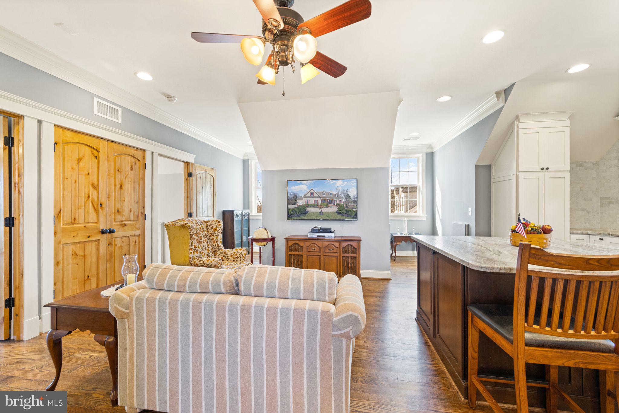 42834 Waxpool Road Ashburn, VA 20148 - Photo 106 of 128 3 1/2" oak hardwood T&G stained in place.