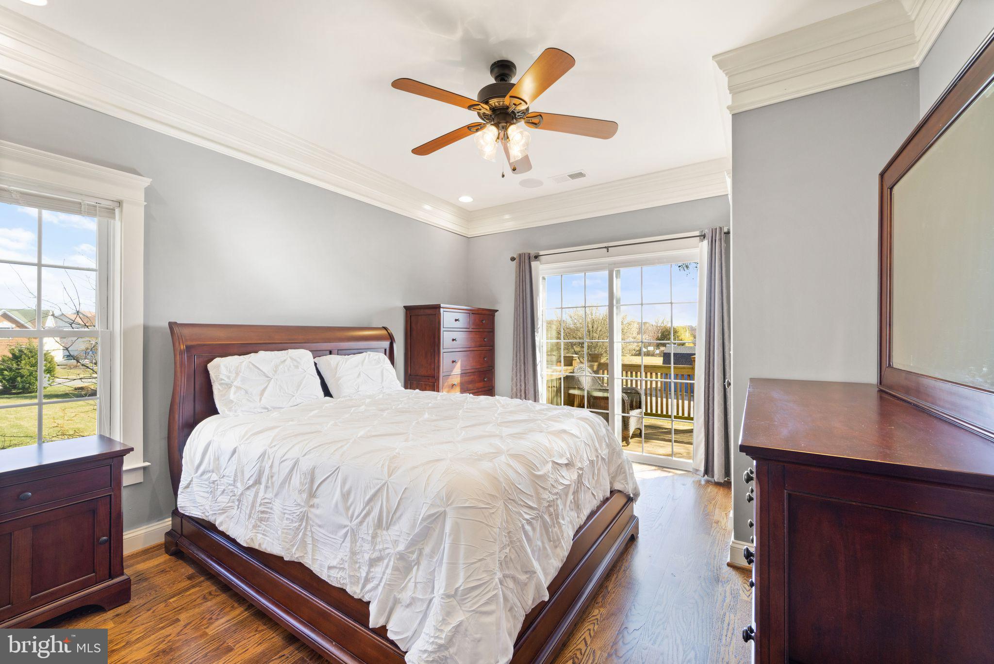 42834 Waxpool Road Ashburn, VA 20148 - Photo 113 of 128 Primary Bedroom with walk in closet, deck off room