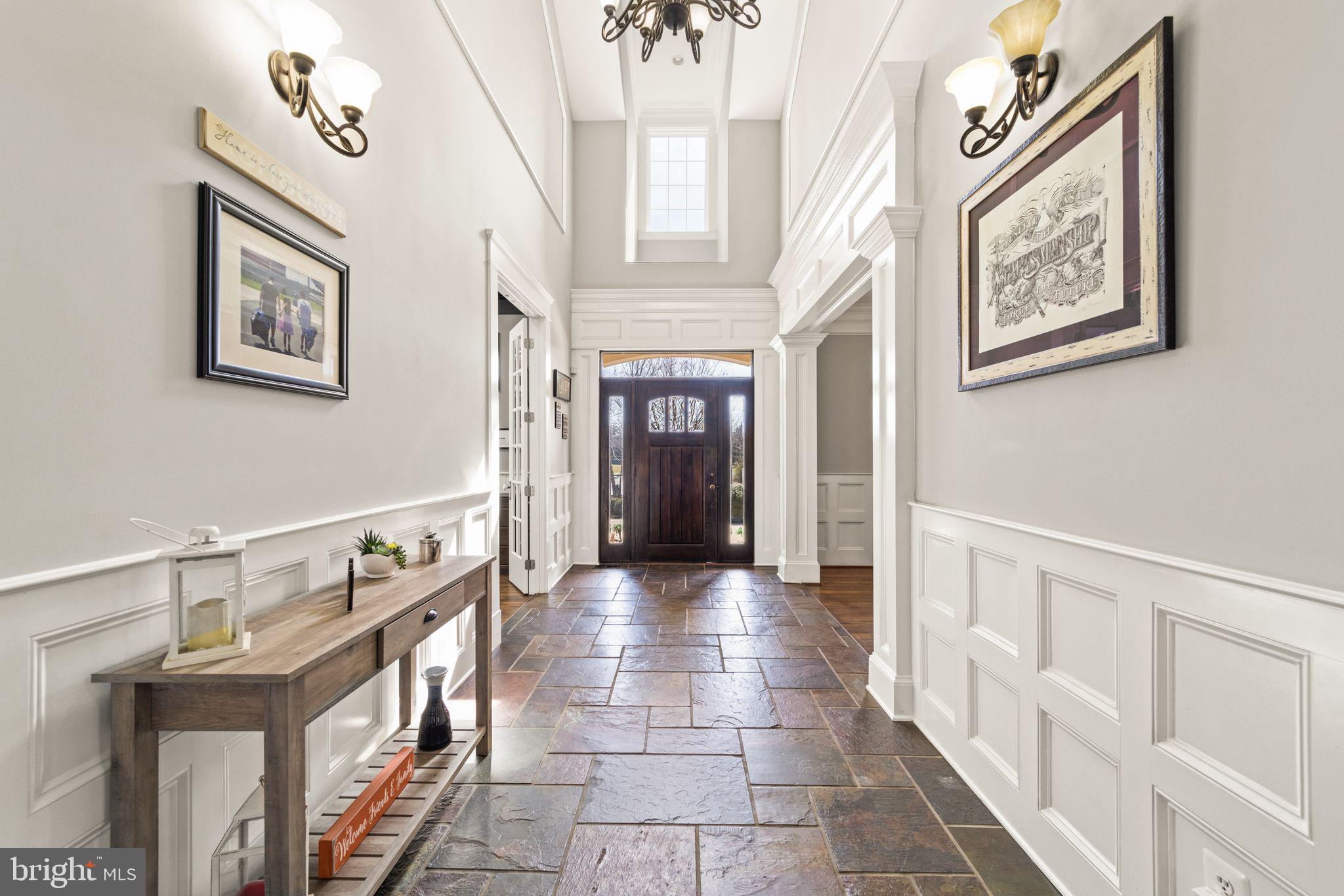 42834 Waxpool Road Ashburn, VA 20148 - Photo 17 of 128 Chair rail & Williamsburg panel wainscoting.