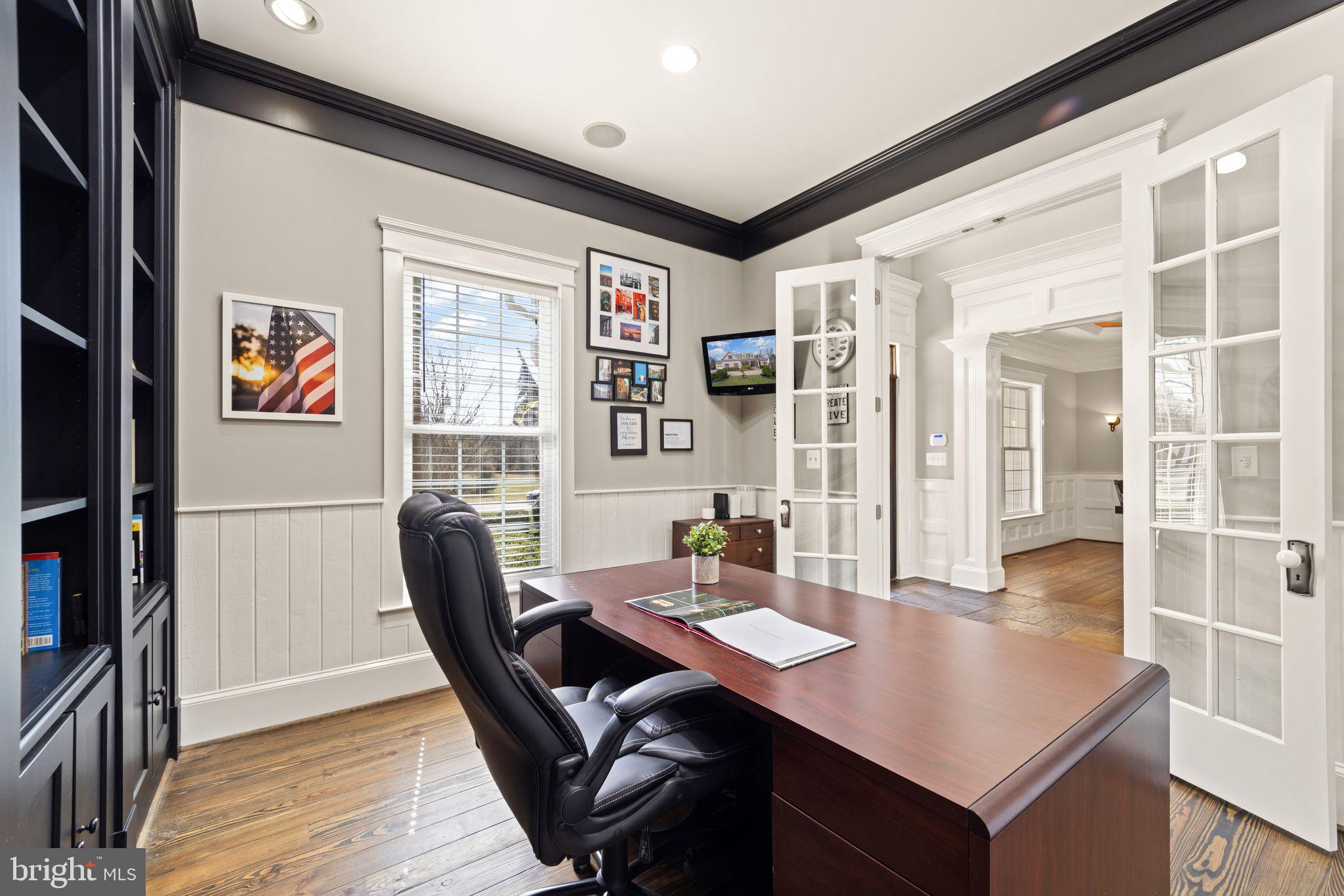 42834 Waxpool Road Ashburn, VA 20148 - Photo 19 of 128 Office with built-in shelves & crown molding.
