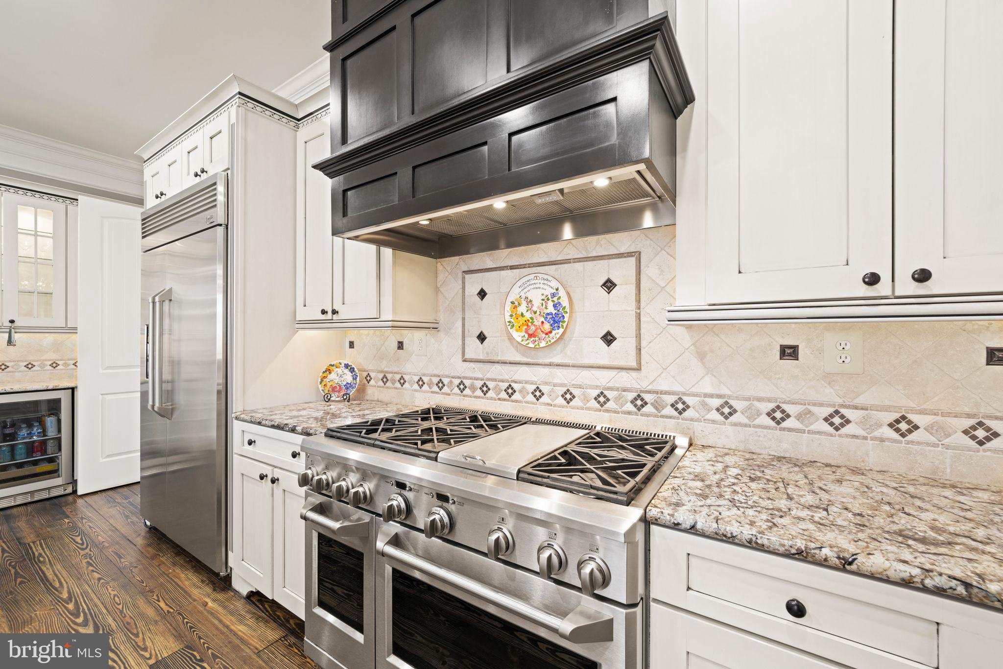 42834 Waxpool Road Ashburn, VA 20148 - Photo 24 of 128 GE Monogram Series 48" oven and Refrigerator