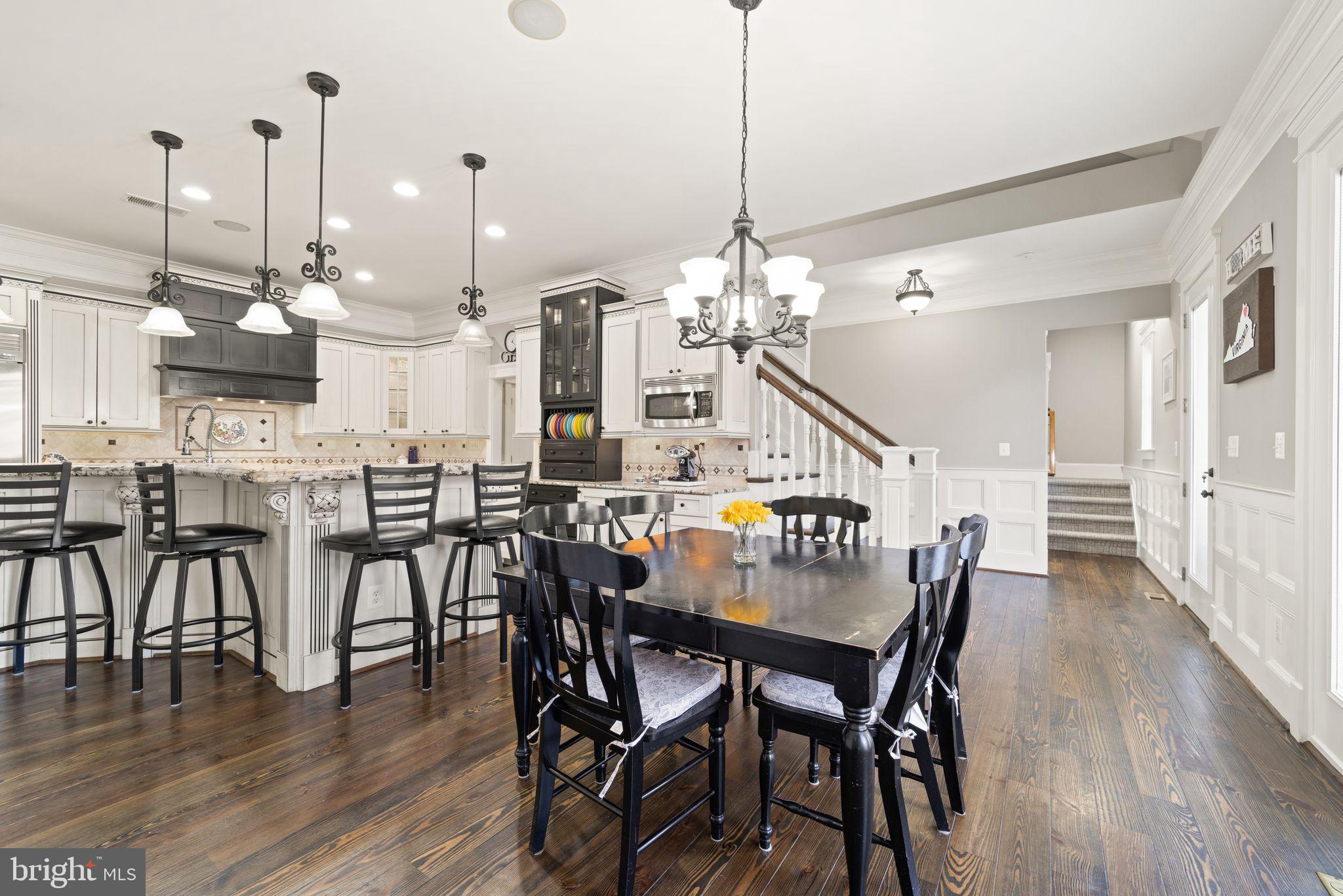 42834 Waxpool Road Ashburn, VA 20148 - Photo 28 of 128 Breakfast room and view of kitchen.