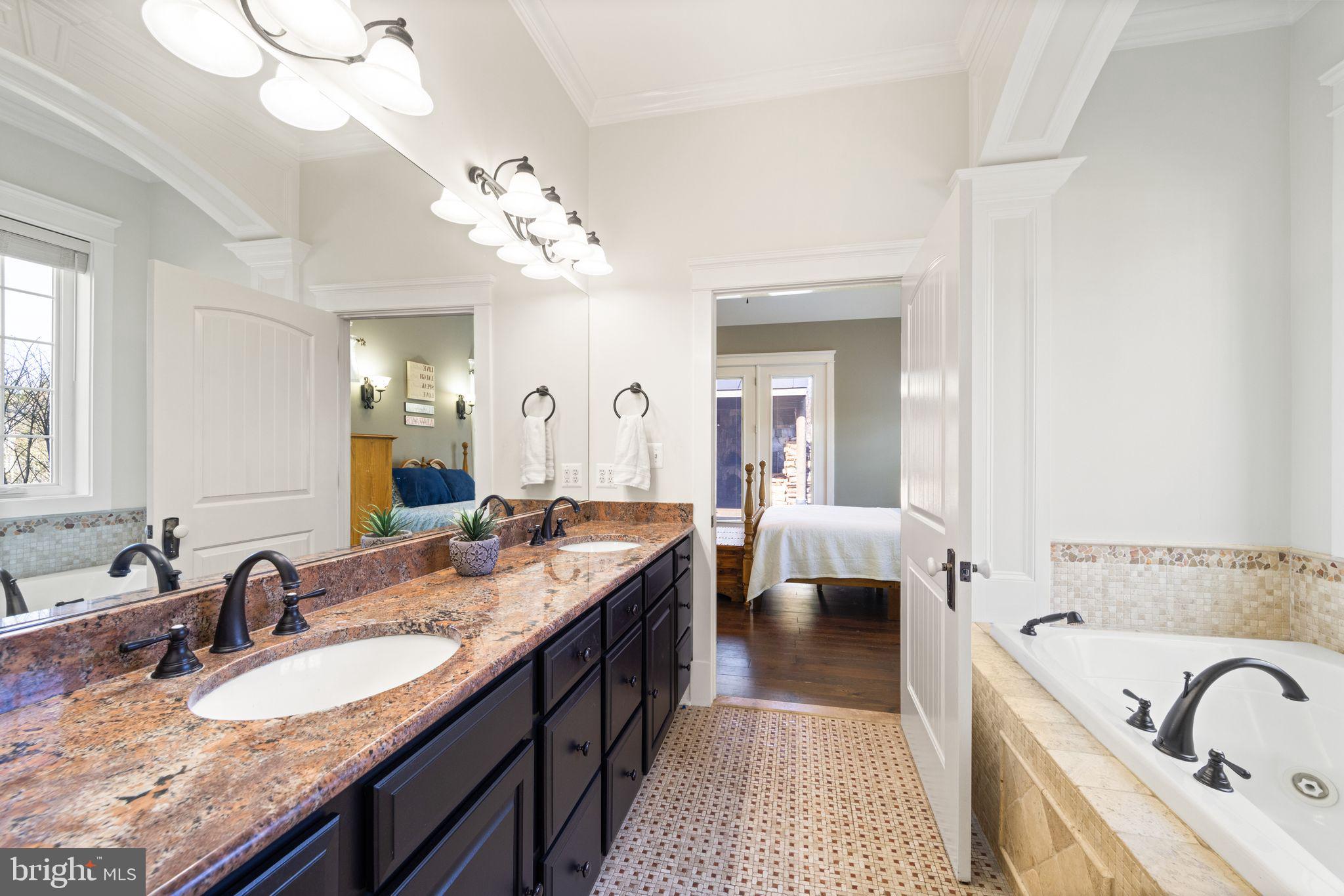 42834 Waxpool Road Ashburn, VA 20148 - Photo 37 of 128 Primary bathroom with Jacuzzi tub & Heated floors.