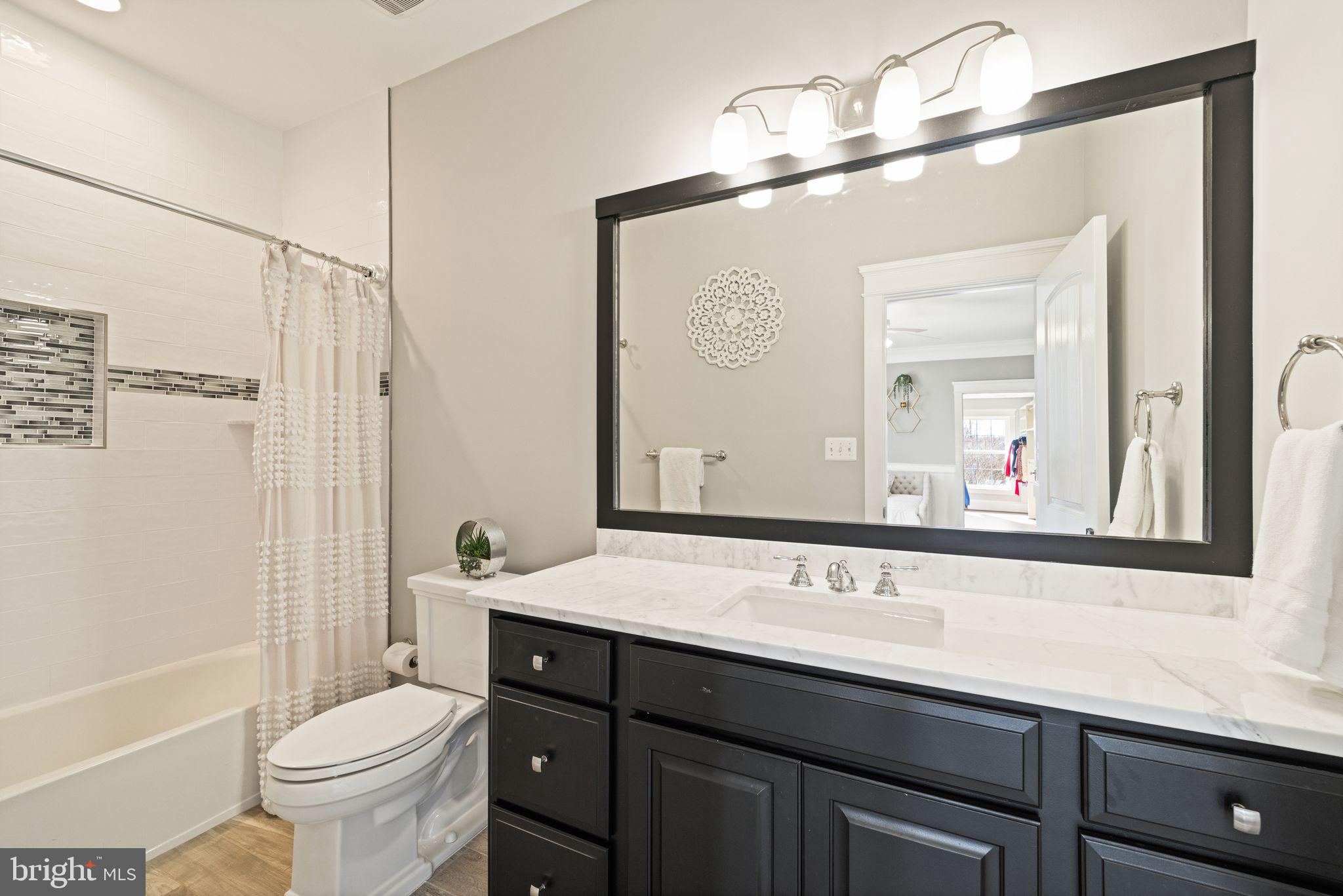 42834 Waxpool Road Ashburn, VA 20148 - Photo 51 of 128 Private bathroom with granite countertops